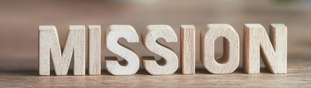 Holzsteine mit der Aufschrift "Mission" vom Unternehmen.